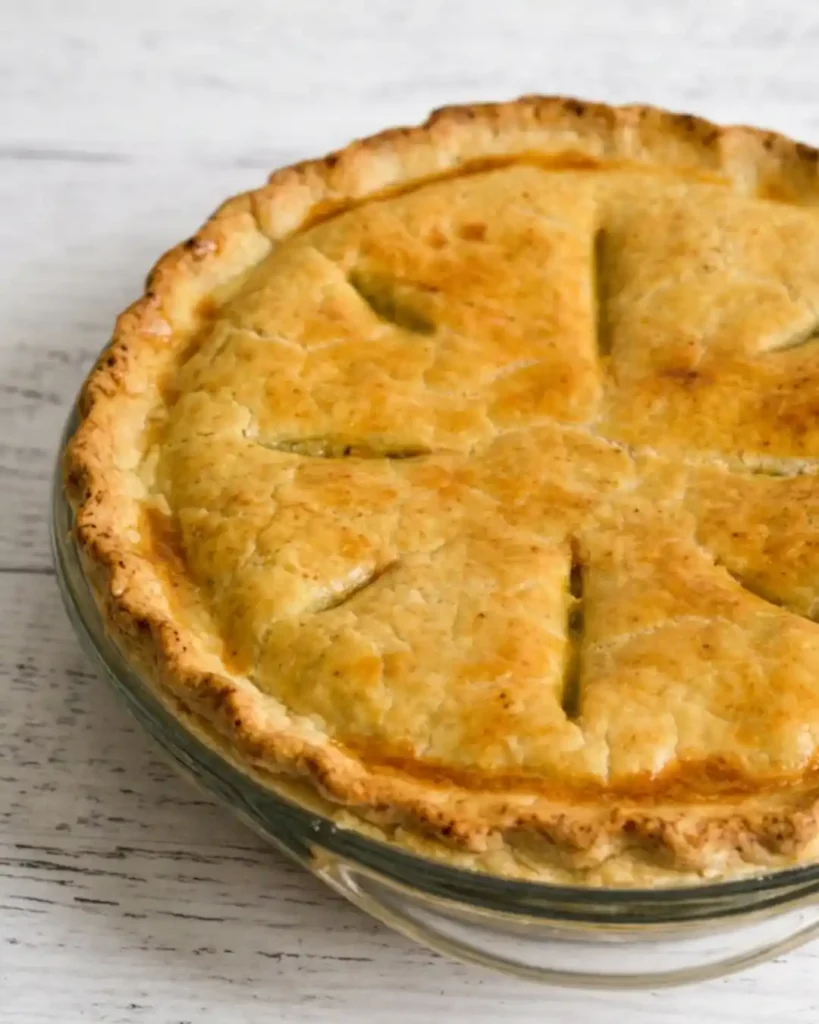 Creamy gluten-free chicken pot pie with tender vegetables and a golden crust.